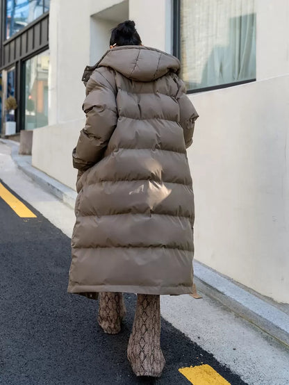 Corinne Long Hooded Puffer Coat with Zip Front and Pockets - Mocha