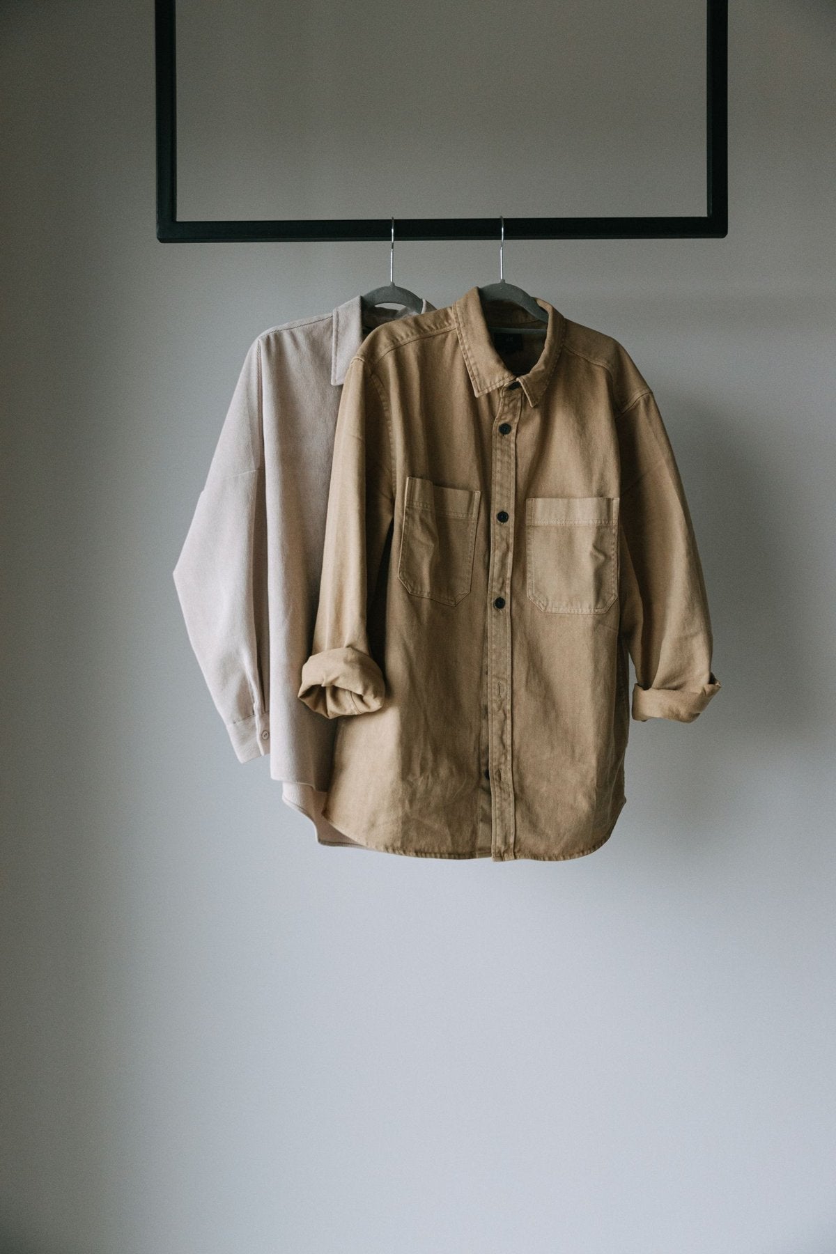Mensa — knit flatlay still life ivory camel tones